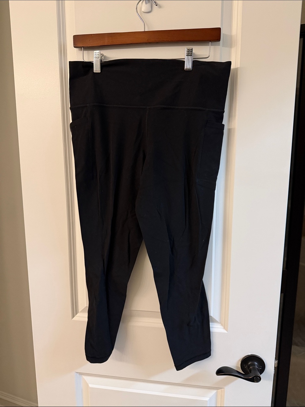 Athleta Black High-Rise Capri Leggings with Side Pockets